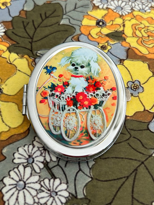 A Welcome Wagon Compact Mirror
